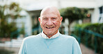 Portrait, smile and senior man at garden by nursing home for wellness, health or life insurance. Glasses, retirement and face of happy elderly person outdoor for relax, fresh air or confident in USA