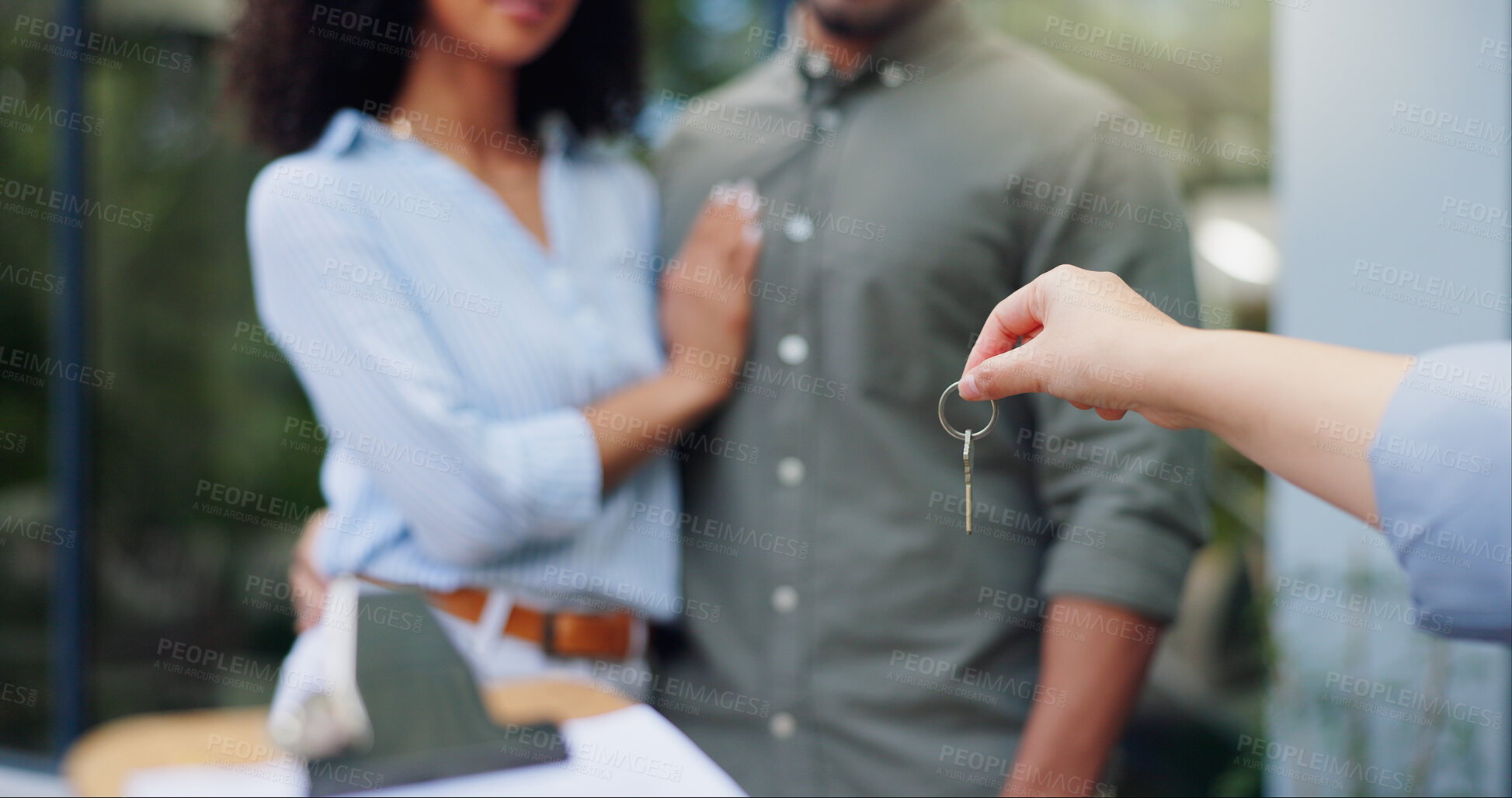 Buy stock photo Hands, keys and outdoor at new house with couple, realtor and hug for property with deal, clipboard and sale. People, backyard and real estate agent with agreement, contract or paperwork in Canada