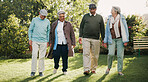 Senior people, together and bonding in retirement home as pensioners for activity, walking or relax. Group, elderly care and friends for outdoor, garden or backyard in nursing village or community