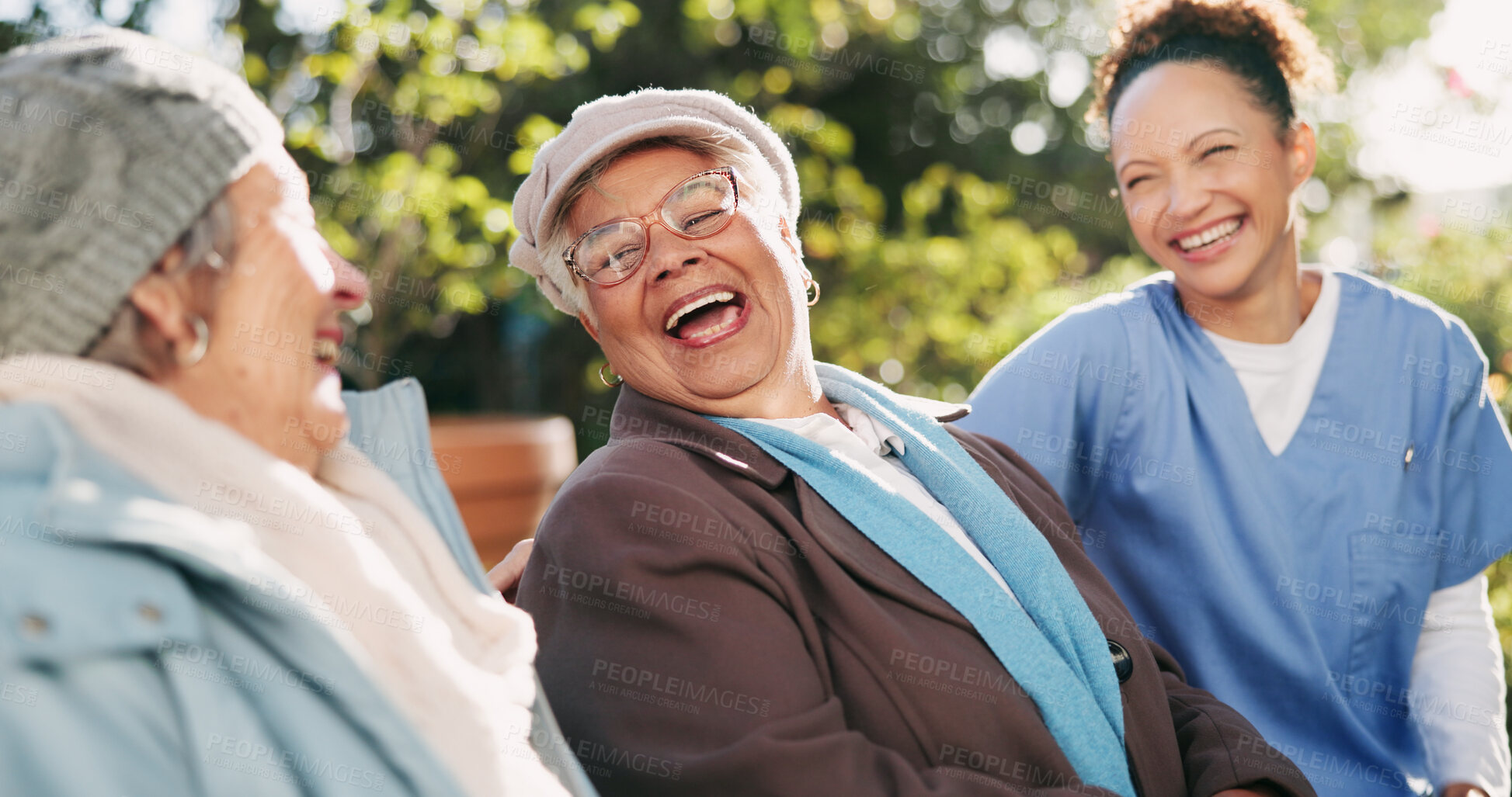 Buy stock photo Nurse, senior women and laughing at park for funny conversation, community care and rehabilitation. Caregiver, retirement and friends relax in garden together for support, healthcare and happiness