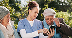 App, phone and nurse with old people in park together for assisted living, communication or healthcare. Medical, trust or update with senior people and caregiver outdoor in nature for consulting