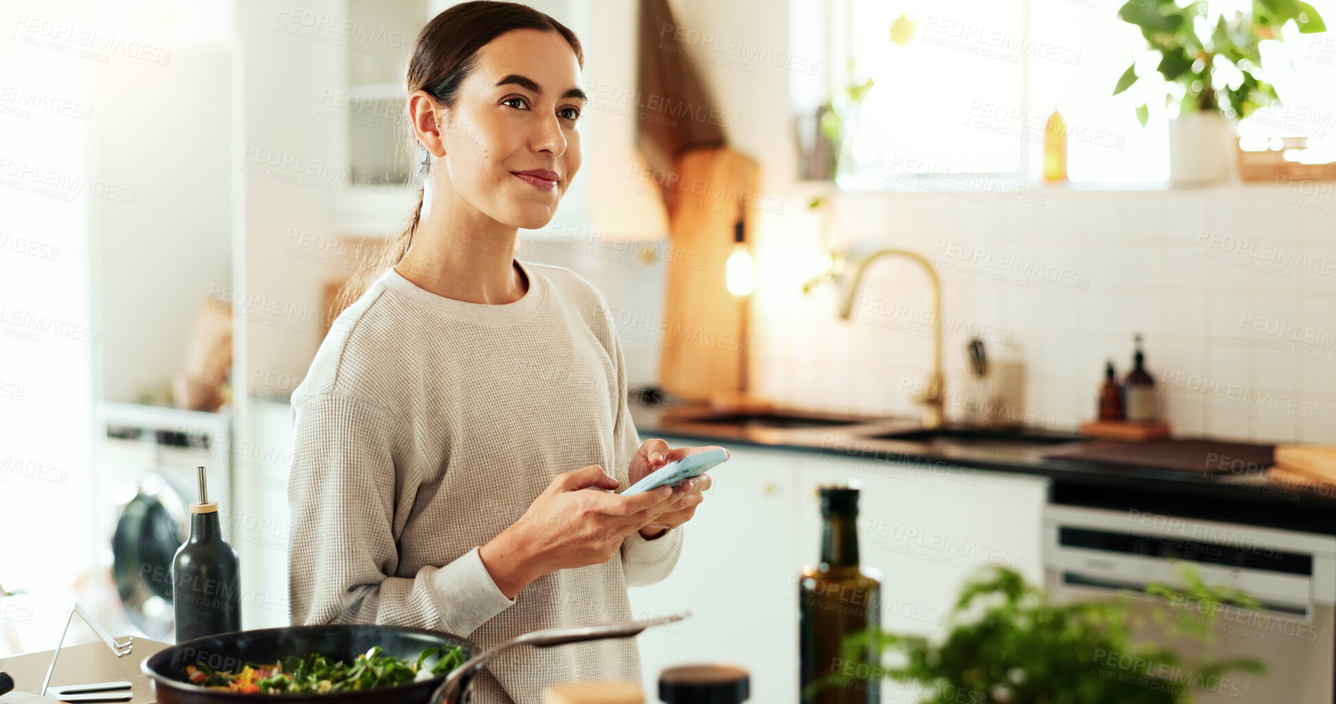 Buy stock photo Woman, cooking and thinking with phone in kitchen for healthy online recipe, meal ideas and salad inspiration. Nutrition influencer, food blogger or vegan chef with social media tutorial in apartment