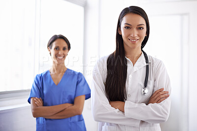 Buy stock photo Portrait, leader and medical team with confidence, smile and women in hospital for healthcare. Face, doctor or nurse with arms crossed in collaboration for wellness, cooperation or coworking together