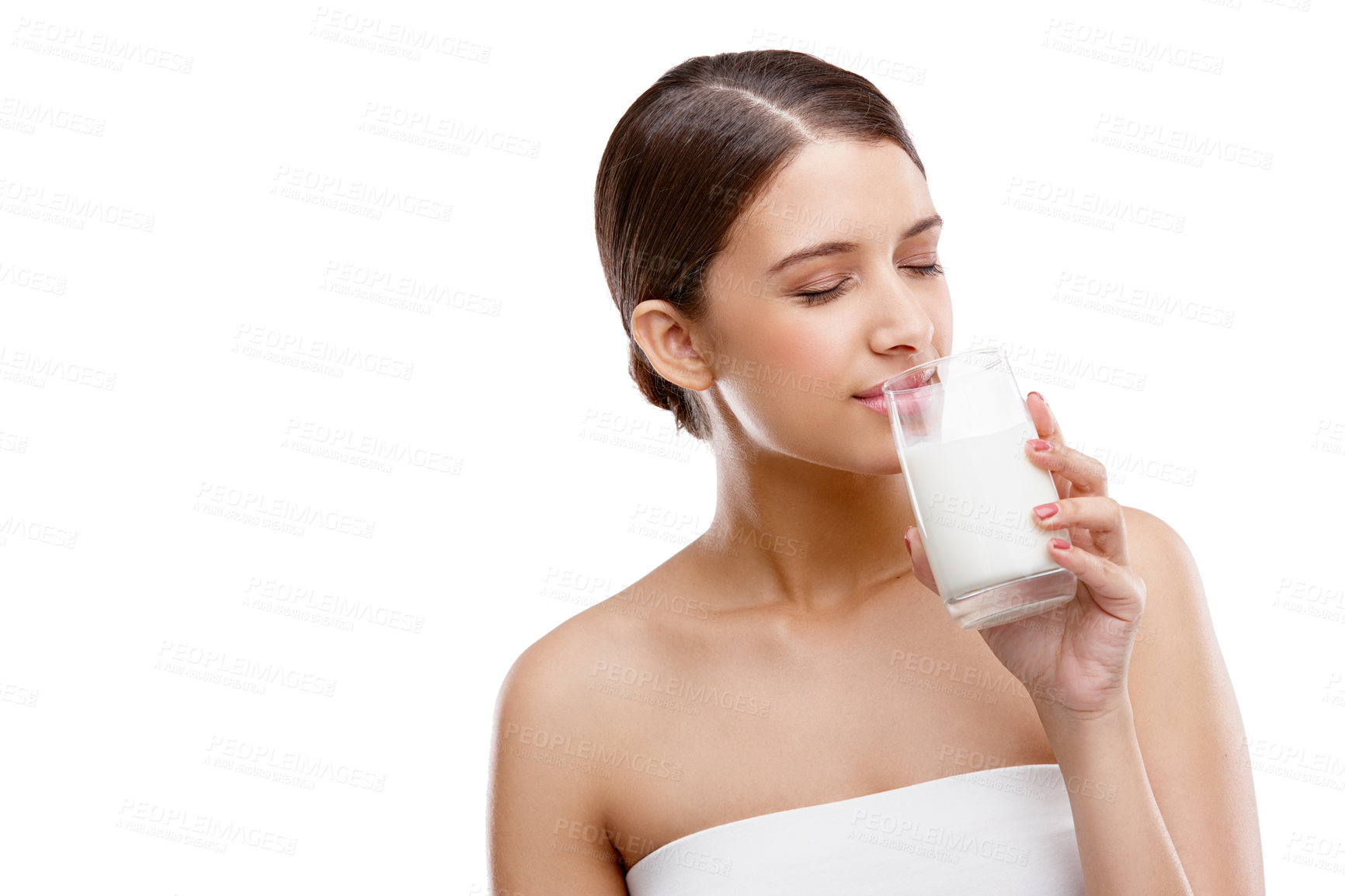 Buy stock photo Woman, drinking milk and glass in studio for health, calcium and mockup space by white background. Girl, person and model with dairy, happy and benefits with choice for diet, nutrition and detox