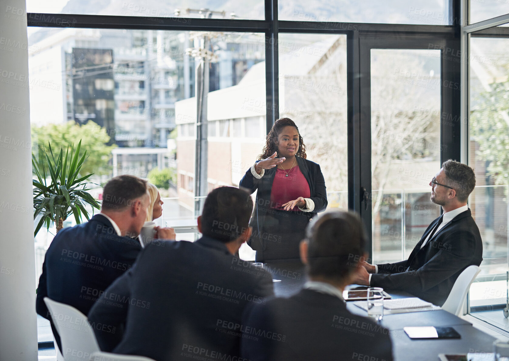 Buy stock photo Presentation, leadership with woman and colleagues in a business meeting in a boardroom of their workplace together. Planning or brainstorming, teamwork or collaboration and coworkers in office
