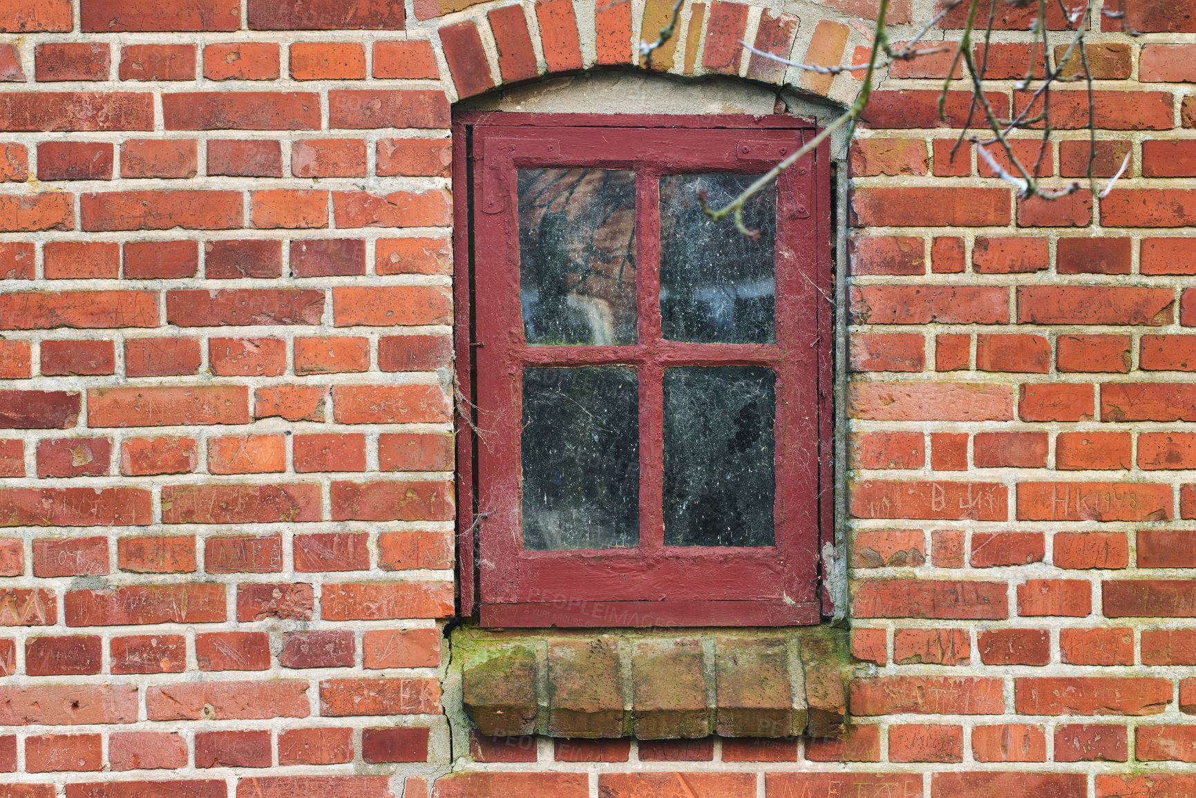 Buy stock photo Old building, glass and window with brick wall in city, ghost town and abandoned house. Windowsill, home exterior and vintage architecture with grunge graffiti, moss or webs for halloween in Ireland