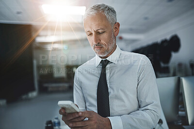 Buy stock photo Business, mature man and message on smartphone at office for email notification and social media. Male person, manager and boss on internet or online for communication, networking and connection