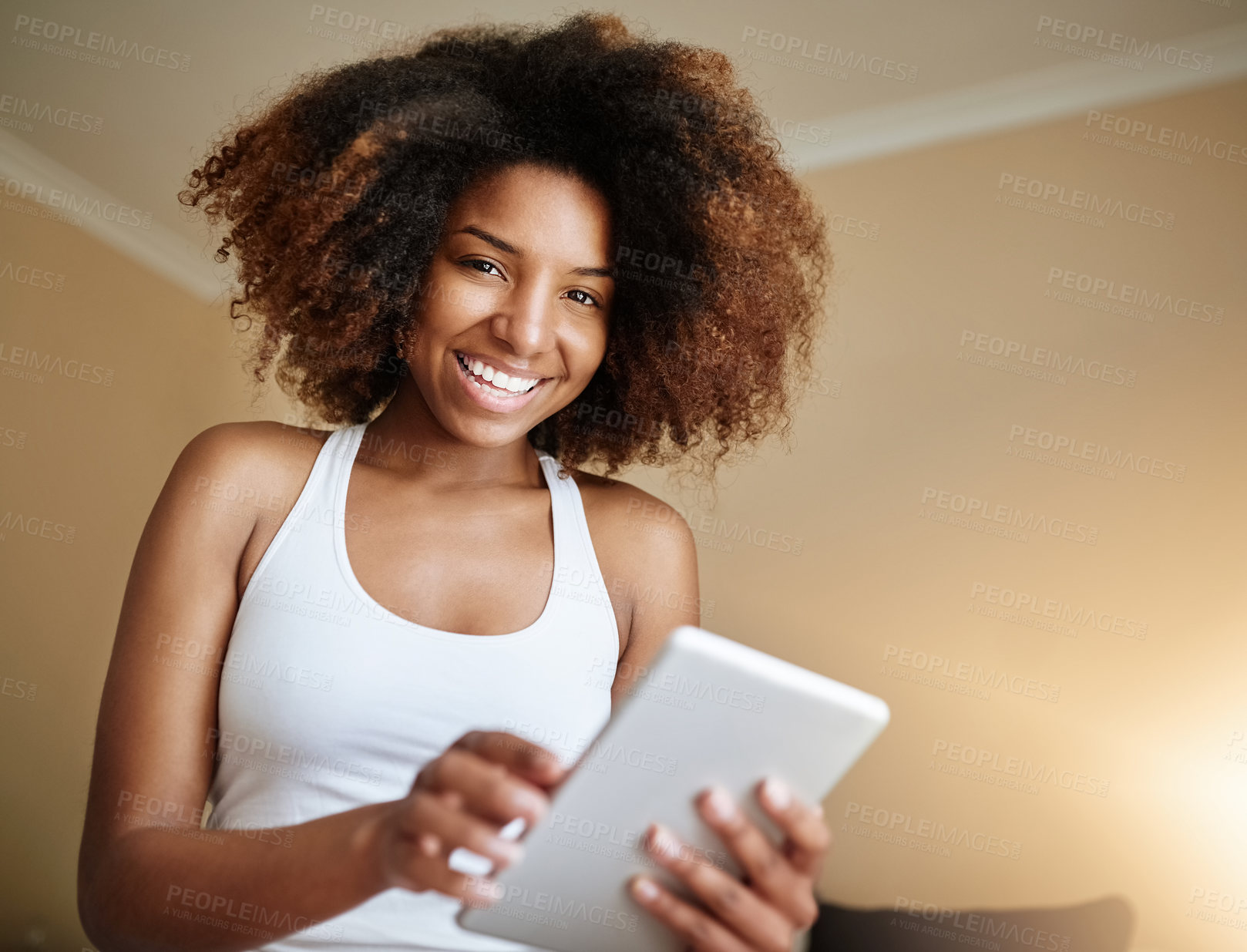 Buy stock photo Woman, happy or tablet with portrait in home for notifications, social media scroll and reading morning news. African girl, smile or relax in bedroom with digital tech for online shopping or browsing