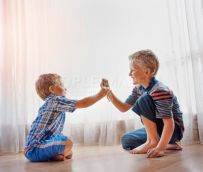 Buy stock photo Little boy, brother and playing with toys on floor for bonding, weekend or childhood together at home. Children, kids or siblings enjoying action figures or playful family time for holiday at house