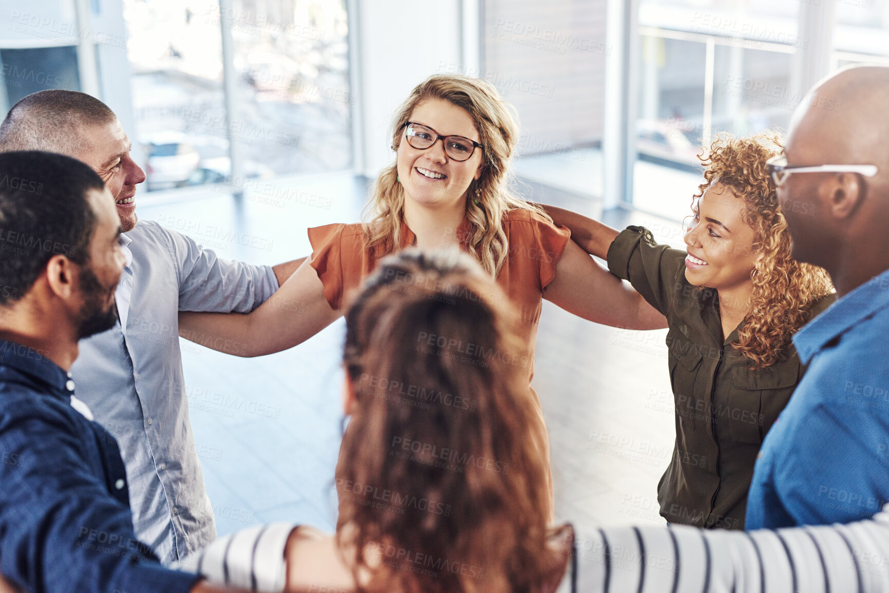 Buy stock photo Office, team building and huddle together in support for teamwork, collaboration and motivation at startup. Work, goals and diversity, group of people with business growth and creative staff embrace