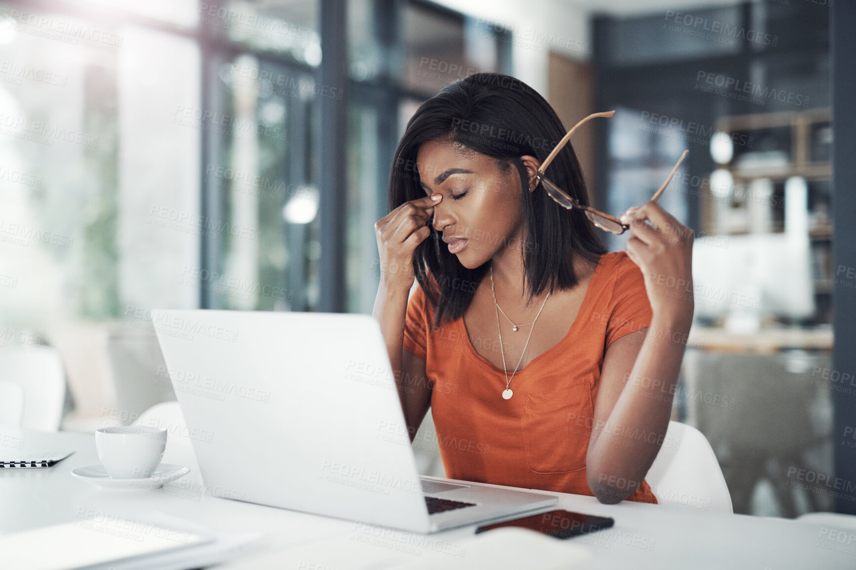 Buy stock photo Black woman, stress and laptop with headache for deadline, pressure or strain at office desk. Young African, female person or frustrated employee with migraine or vertigo on computer from burnout