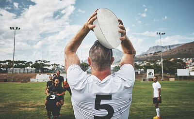 Buy stock photo Team, rugby player and tournament for play, game or competition in exercise or fitness. People, athlete and recreation facility in challenge for outdoor, sport or training center as together on field