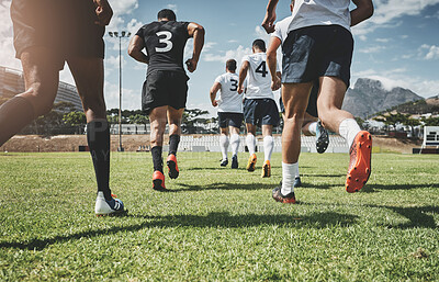 Buy stock photo Running, rugby and start with men on field for stadium, championship and premiership league. Teamwork, sports athlete and global competition with back of people in football club for tournament games