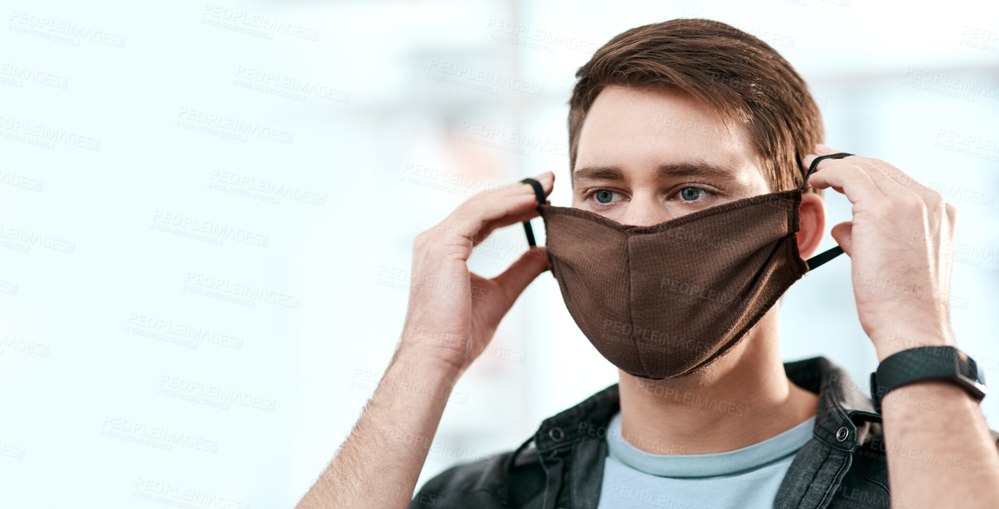 Buy stock photo Safety, wearing and man in home with mask for bacteria protection, respiratory hygiene or infection control. Male person, covid virus and fabric material cover for airborne germs, allergy or wellness