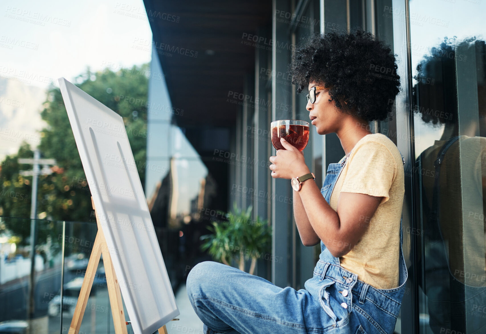 Buy stock photo Canvas, painting and tea with woman on balcony of home for creativity, expression or inspiration outdoor. Drink, relax or wellness and painter person at apartment for art, hobby or break with easel