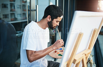 Buy stock photo Art, painting and palette with man on balcony of home for creativity, expression or inspiration outdoor. Canvas, paintbrush and relax with painter person at apartment for hobby or wellness on easel