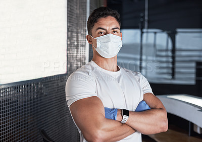 Buy stock photo Health, mask and portrait of man at gym with confidence, safety and compliance for workout hygiene at front desk. Rules, ppe and employee at fitness club with pride, virus protection and arms crossed