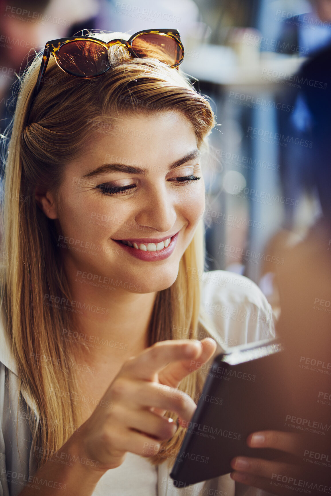 Buy stock photo Woman, smile and relax with tablet at cafe for dating app, communication and message on platform. Person, happy and scroll with tech at restaurant for profile match, response and online conversation