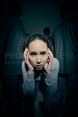 Buy stock photo Mental health, panic and paranoid with woman in studio on dark background for rehabilitation. Anxiety, bipolar and fear with schizophrenia patient in spotlight for healthcare or medical assessment