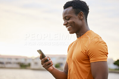 Buy stock photo Outdoor, fitness and black man checking phone for morning training, wellness and challenge at park. Health, smile and happy athlete with smartphone for workout schedule, tracking app or exercise plan