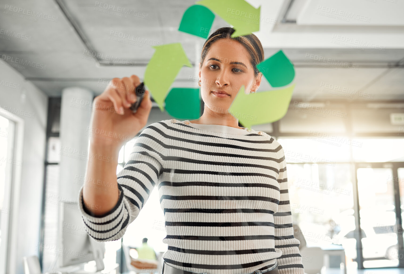 Buy stock photo Office, woman and marker with recycle logo on glass wall for eco friendly, environment and ecology. Business person, employee and serious with brainstorming or planning for green and sustainability