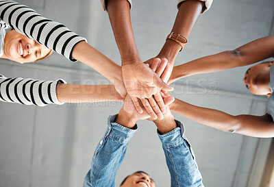 Buy stock photo Business people, hands together and pile for diversity, low angle and agreement or collaboration. Group huddle, employee and team building, motivation or workforce meeting for creative office support