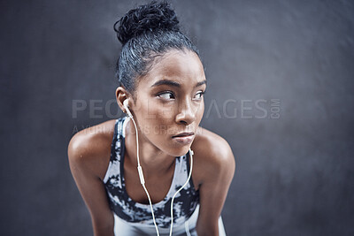 Buy stock photo African woman, workout and break with earphones and thinking with run and marathon training with space. Sport, music and audio with breathing and streaming fitness track for health and wellness