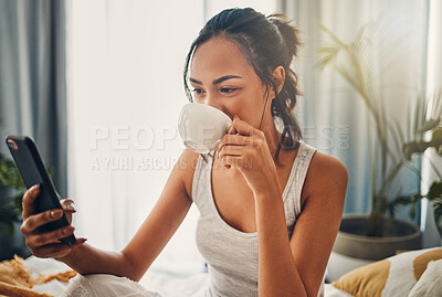 Buy stock photo Drinking coffee, phone and woman in bedroom in home for social media chat, scroll and text message. Mobile, girl and tea in bed to relax, reading blog and download app for morning news on internet