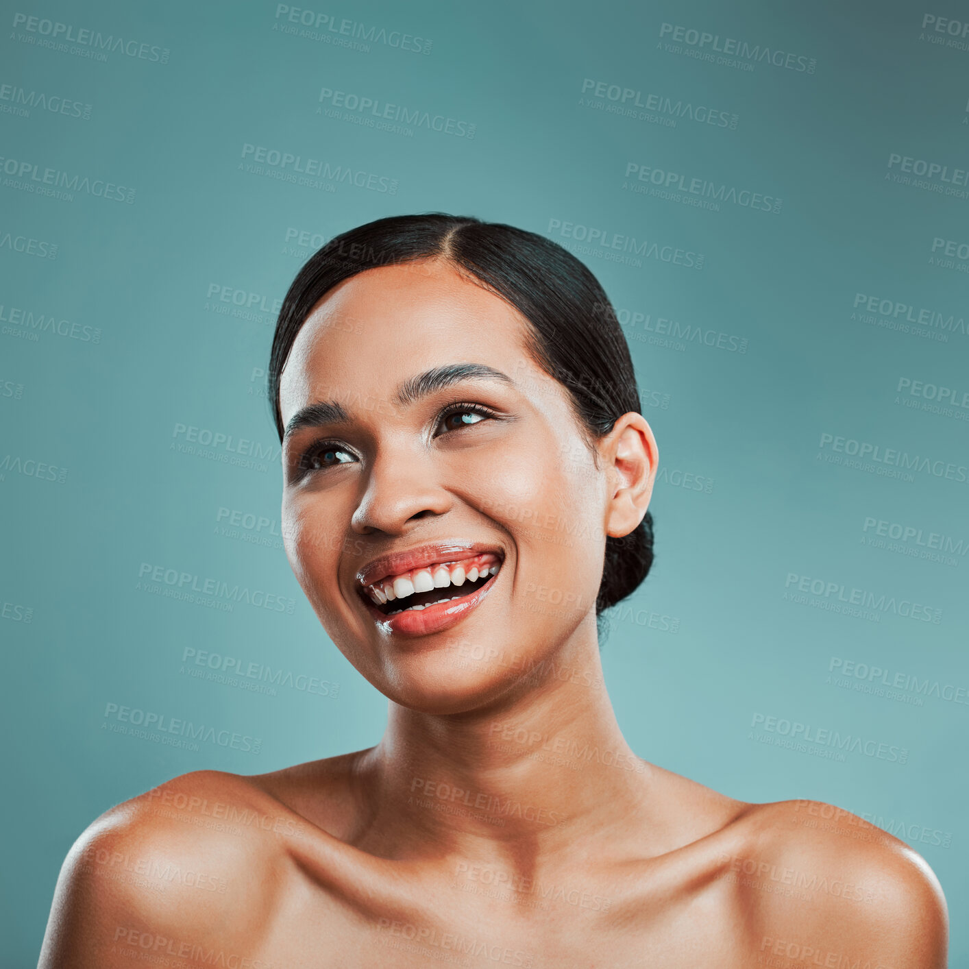 Buy stock photo Results, thinking or happy woman with beauty, skincare or glow in studio on blue background. Treatment ideas, smile or confident girl model with facial health for wellness, shine or makeup in France