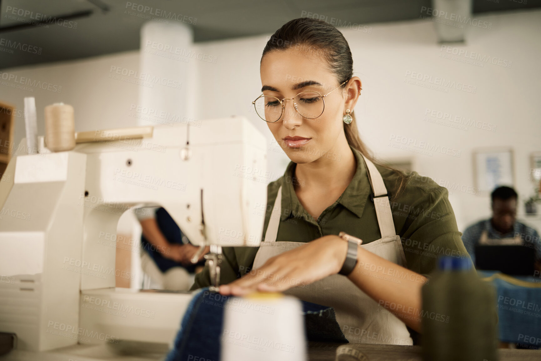 Buy stock photo Fashion, woman and sewing machine with denim in workshop, creativity and manufacturing industry. Small business, female person and designer with equipment for fabric, clothing production and tailor