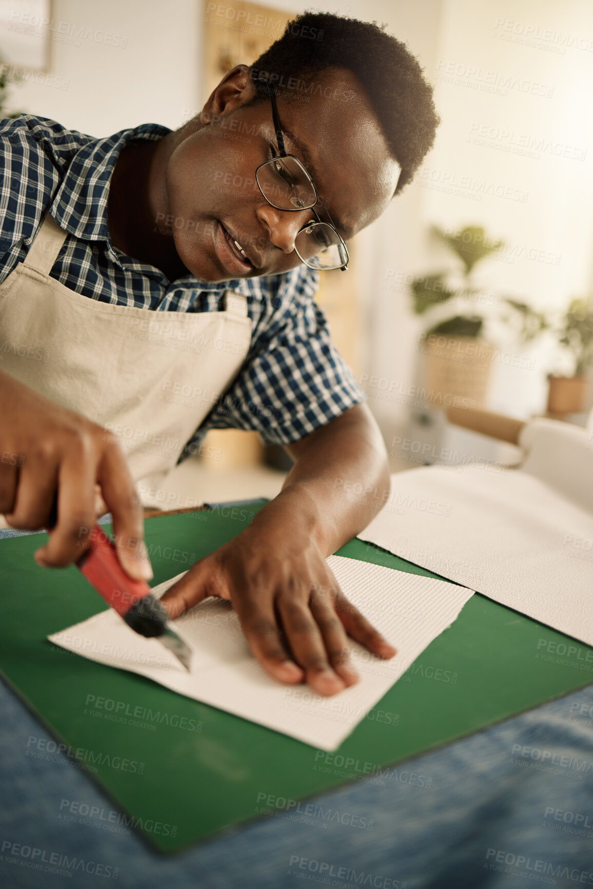 Buy stock photo Black man, tailor and cutting sample for clothes, textures design and manufacturing process. Fashion designer, handmade and cardboard template with fabric pattern, textile production and boutique 