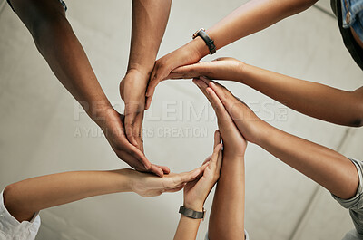 Buy stock photo Hands, people and synergy in office as creative designer in company, business or digital agency. Group, team building and commitment with pride, together and coworking for solidarity or collaboration