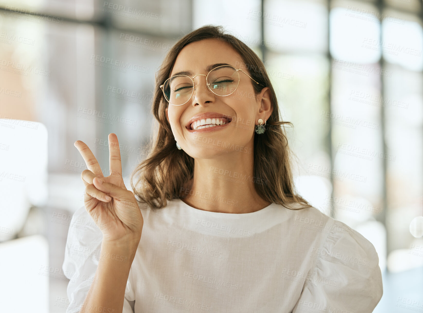 Buy stock photo Peace sign, fun and woman in office, smile and confident with humor, hands and playful with glasses. Expression, happy and goofy with gesture, comedy and success in business, celebration and joy