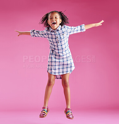 Buy stock photo Happy, jump and portrait of child on pink background with good news, celebration and excited for energy. Fashion, joy and isolated young girl in air for achievement, victory and winning in studio