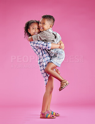 Buy stock photo Happy, hug and portrait of children in studio for bonding, love and cute relationship. Family, childhood and isolated brother and sister embrace for affection, care or fun together on pink background