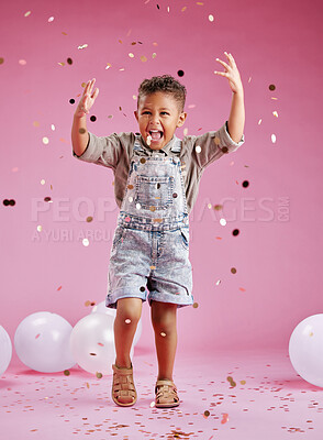 Buy stock photo Boy, child and throw confetti in studio and excited with shout for celebration by pink background. Kid, happy and glitter for cheers, jump and balloons with smile, event or memory at birthday party