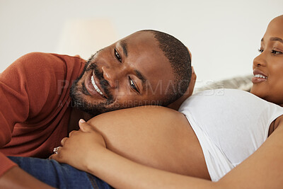 Buy stock photo Black man, pregnant woman and listen to stomach in bedroom with smile, excited and bonding in home. Couple, parents and happy with belly, baby and kicking with connection in morning at apartment