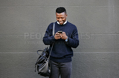 Buy stock photo Black man, happy and phone with travel in city of schedule, morning commute and waiting on transport. Person, mobile and smile with communication, luggage journey and online map of direction outdoor