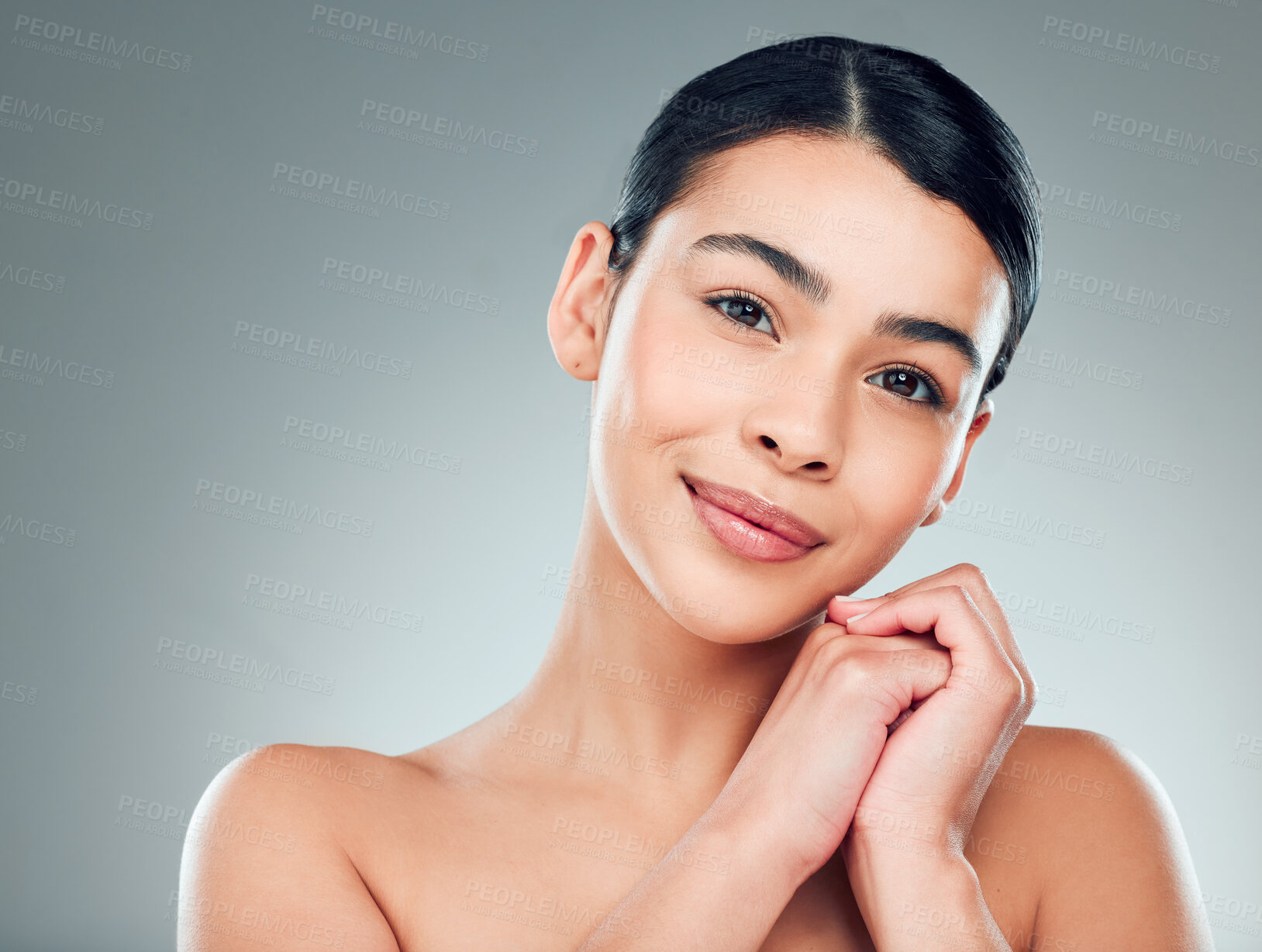 Buy stock photo Skincare, health and portrait of woman in studio with hydration, collagen or facial routine. Natural, beauty and female person from Puerto Rico with face dermatology treatment by gray background.