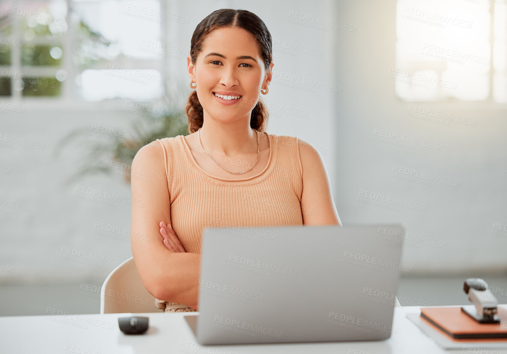 Buy stock photo Woman, portrait and laptop in office with confidence, smile or connectivity at desk. Entrepreneur, small business or computer in workplace with arms crossed, innovation or email communication in Peru