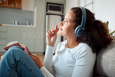 Buy stock photo Woman thinking, headphones and home for writing in book, podcast inspiration and gratitude journal. Female person, plan and streaming radio on floor of apartment, ideas and notepad for self care