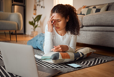 Buy stock photo Home, floor and woman with headache by laptop for eye strain, fatigue and discomfort of pressure. Technology, stress and person with pain in living room for migraine, tension and vertigo on pillow