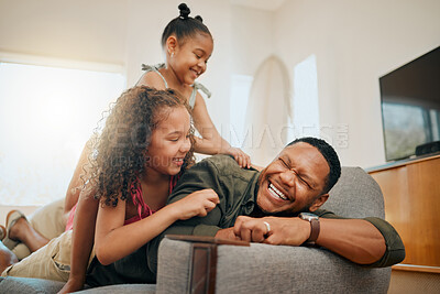 Buy stock photo Laughing, tickle and support with family on sofa for love, playful game and happiness together. Care, energy and funny with father and children in living room at home for silly, comedy and joke