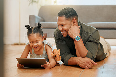 Buy stock photo Father, kid and tablet on floor in home for playing games, watching online cartoons and bonding together. Happy, man and girl on digital tech in lounge with movie entertainment on streaming service