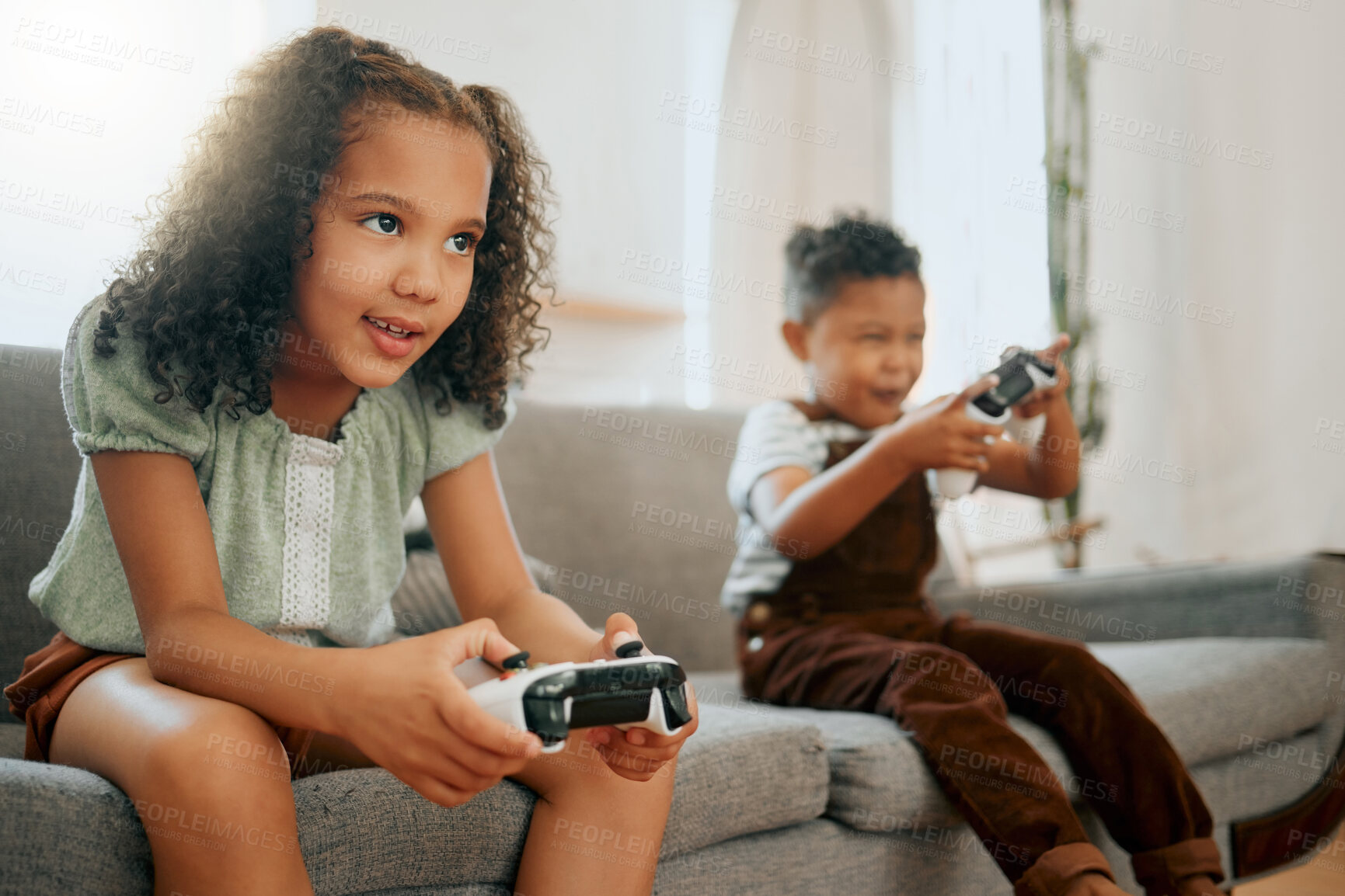 Buy stock photo Smile, controllers and children on sofa with video game for bonding, weekend and relax in home. Happy, rest and kid siblings live streaming electronic entertainment for fun in living room at house.