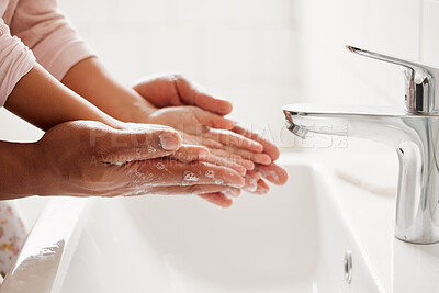 Buy stock photo Parent, child and washing of hands in bathroom for teaching healthy habits, hygiene support and disinfection in home. People, water and soap for dirt, bacteria prevention or cleaning routine by basin