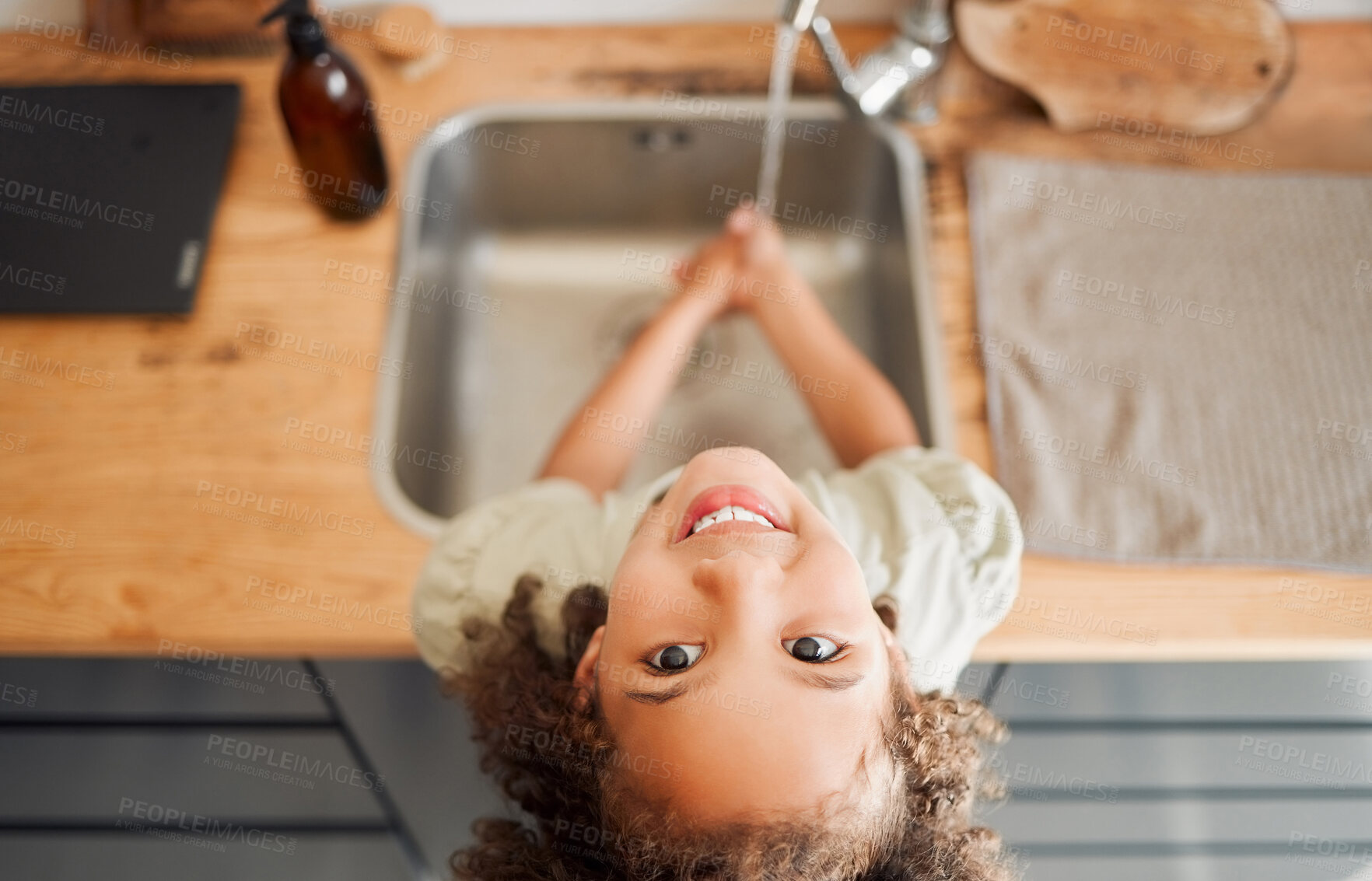 Buy stock photo Kid, portrait and water for washing in kitchen sink with learning healthy habits, hygiene routine and disinfection. Girl, top view and liquid soap for dirt, bacteria prevention and protection in home