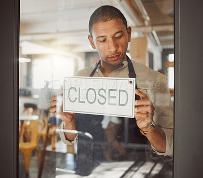 Buy stock photo Man, entrance and business owner with closed sign for cafe announcement, financial crisis and end of trading hours. Notice, male waiter and poster for retail news, service information and bankruptcy
