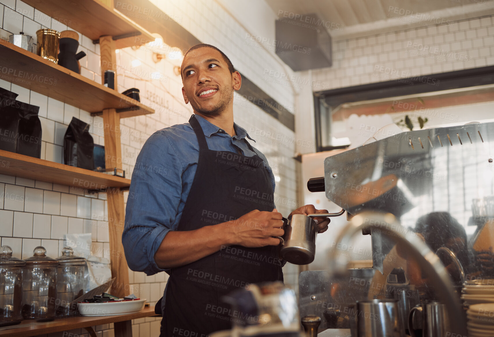 Buy stock photo Barista, milk and steam with coffee machine in cafe for espresso, cappuccino and latte with hospitality. African man, happy and heating in restaurant kitchen for drink, foam and professional service