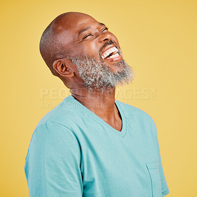 Buy stock photo Happy, comedy and black man laughing in studio with wellness isolated on yellow background. Joy, African model or mature person with funny joke, humor and positive energy with smile or casual style